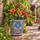 Extra large Mexican Talavera planter (TP195A) planted with a mix of greenery and colorful flowers.